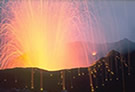 Volcanic eruption  from Stromboli volcano , With  incandescent lava show at night.